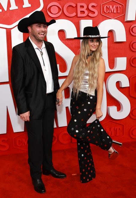 AUSTIN, TEXAS - APRIL 07: (L-R) Devlin "Duck" Hodges and Lainey Wilson attend the 2024 CMT Music Awards at Moody Center on April 07, 2024 in Austin, Texas. (Photo by Matt Winkelmeyer/Getty Images for CMT)